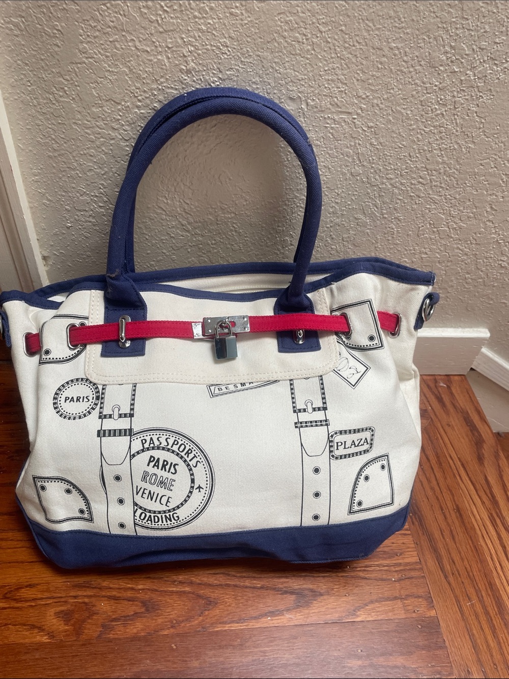 Canvas Travel Tote in White with Navy Handles and Pink Accent Strap.